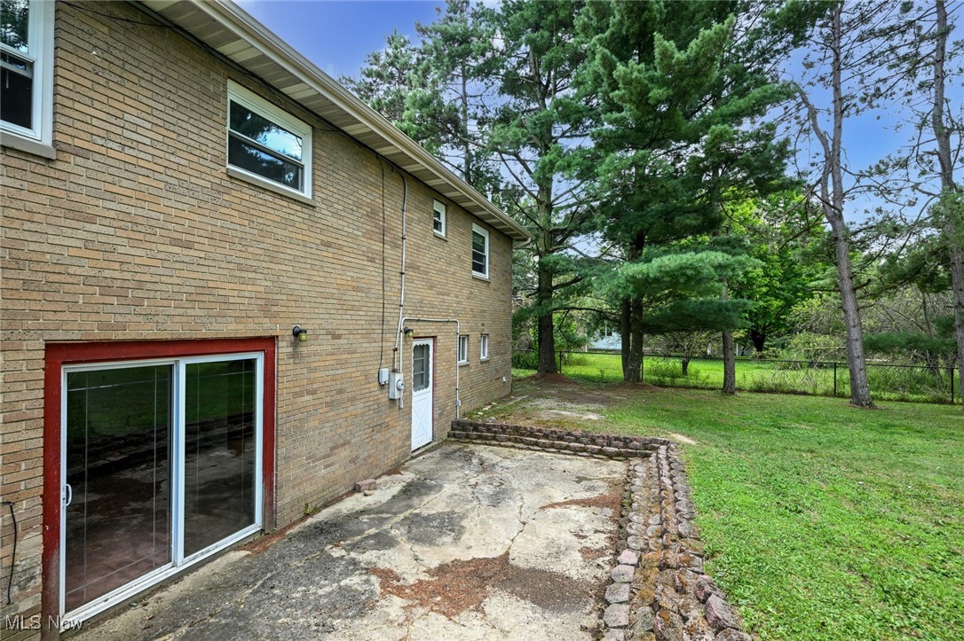 3079 Stroup Road Atwater, OH 44201 - Photo 11 of 40 Welcome to 3079 Stroup Rd, Atwater, OH 44201-9105 - The rear patio, sliding door into the family room, and the patio sotne steps.