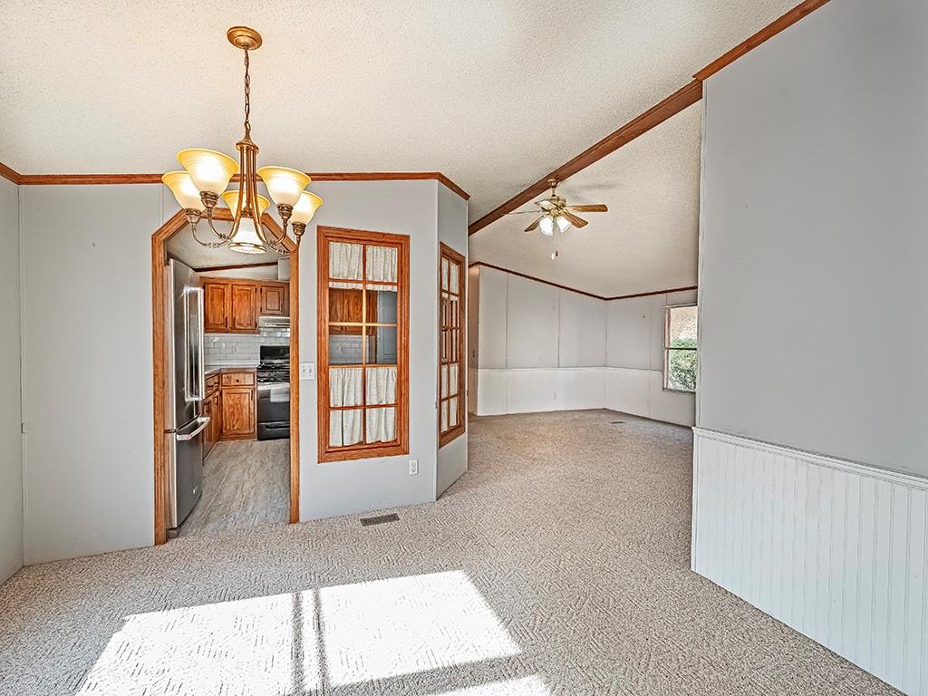 120 Dance Hall Road Apollo, PA 15613 - Photo 7 of 28 a view of a hallway with windows and chandelier