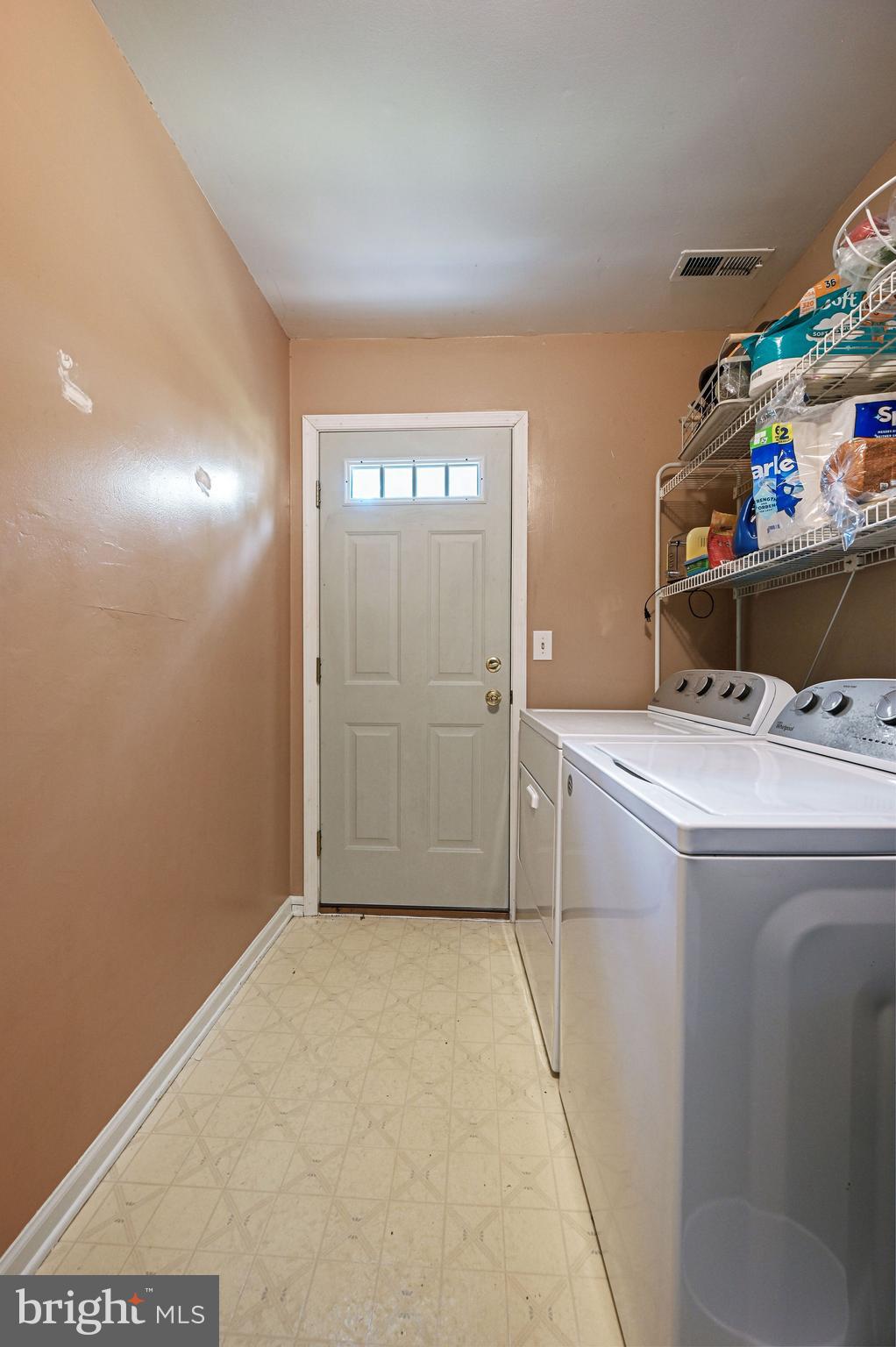 447 Alder Road Dover, DE 19904 - Photo 16 of 27 Laundryroom/storage off garage