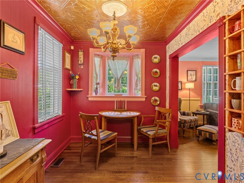 2720 Osborne Road Chester, VA 23831 - Photo 12 of 54 Dining area featuring rich red paneling, wood-fini