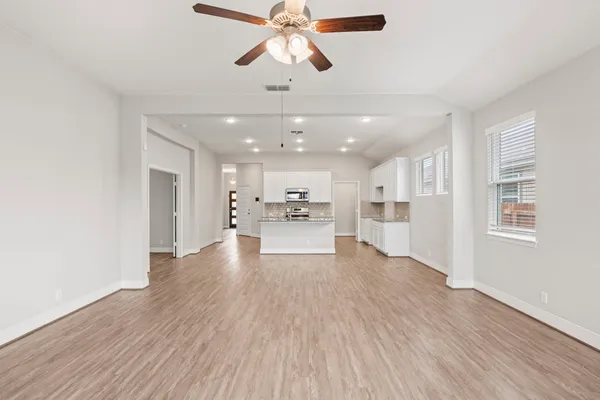 a view of a water pond with lots of green space