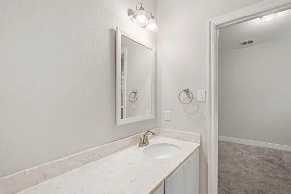 a kitchen with sink and window