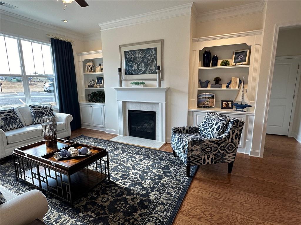 1702 Bonica Crossing, Unit 1702 Cumming, GA 30040 - Photo 3 of 18 a living room with furniture rug and window