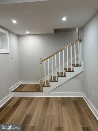 a view of wooden floor in an empty room