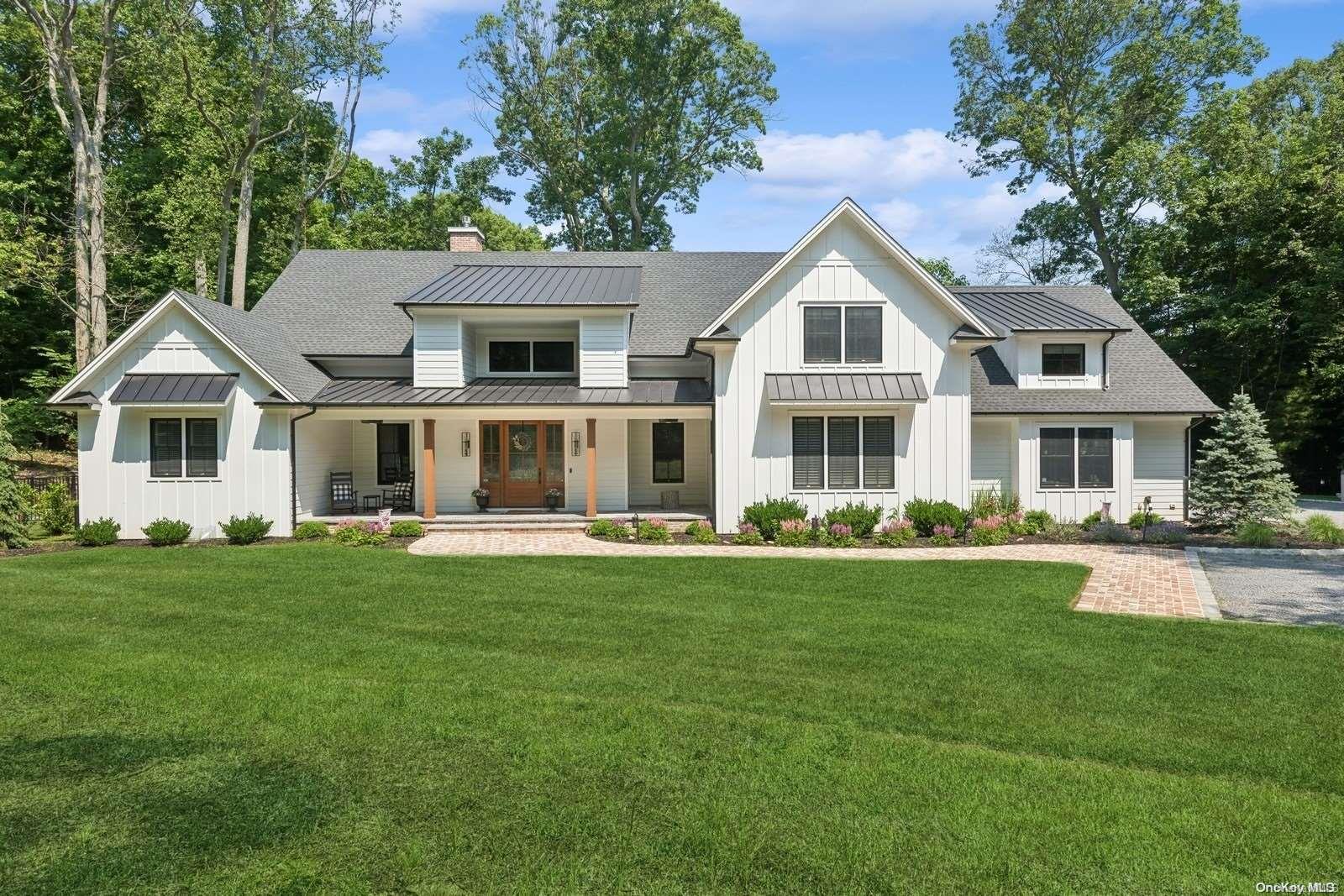 16 Gate Road St. James, NY 11780 - Photo 1 of 1 a front view of house with yard and green space