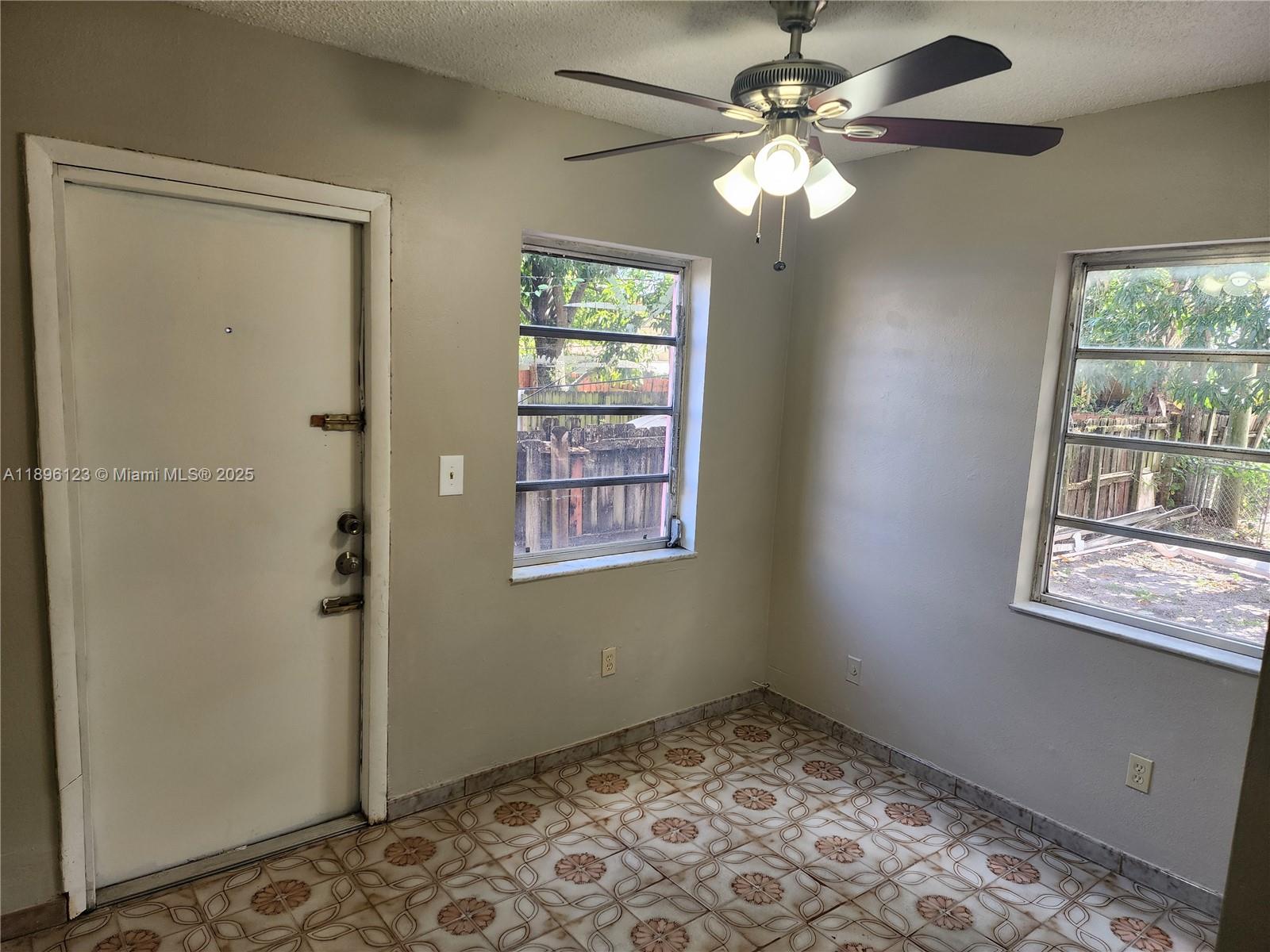 74 East 17th Street, Unit 70 Hialeah, FL 33010 - Photo 19 of 38 a view of an empty room with a window