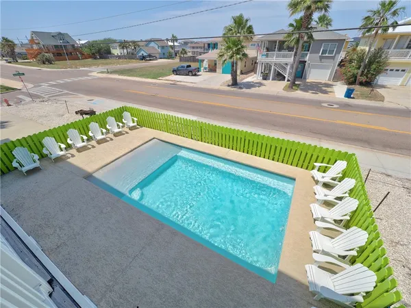 a view of a back yard of the house