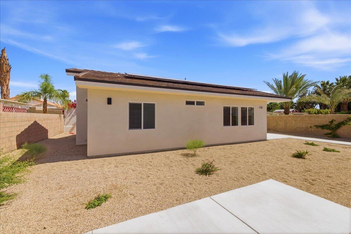 68160 Modalo Road Cathedral City, CA 92234 - Photo 33 of 57 a view of a house with a backyard