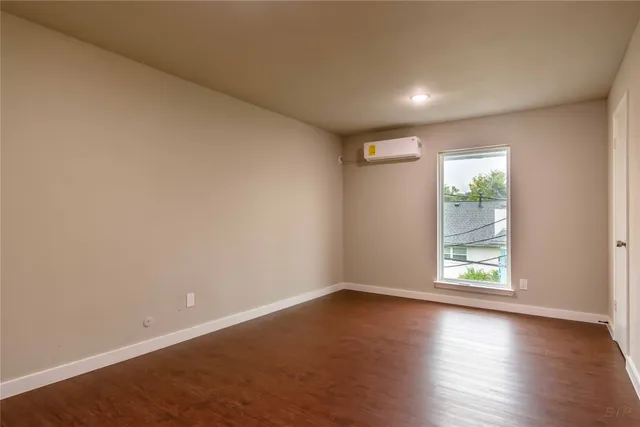 a bathroom with a toilet a sink and bathtub