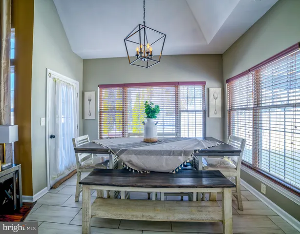 a view of front door with dining room