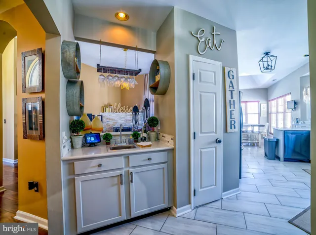 a view of a kitchen center island and cabinets