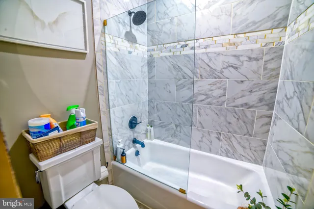 a bathroom with a sink and bathtub