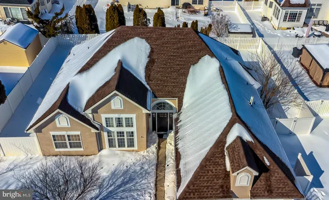 a view of a house with wooden stairs