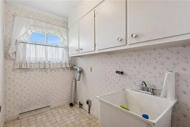 a bathroom with a sink and tub