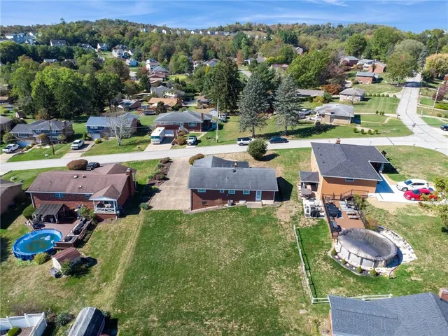 a view of a house with a garden