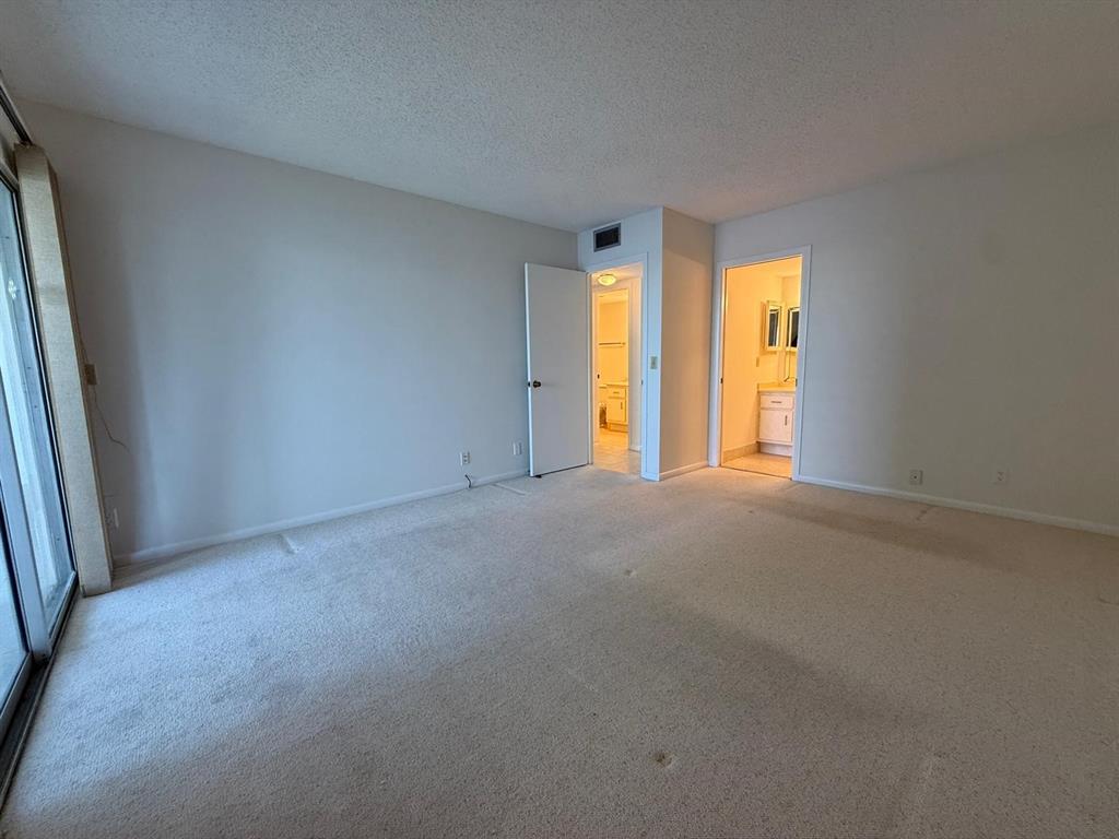 3022 Ainslie Drive, Unit 3022 Boca Raton, FL 33434 - Photo 16 of 29 a view of empty room with window