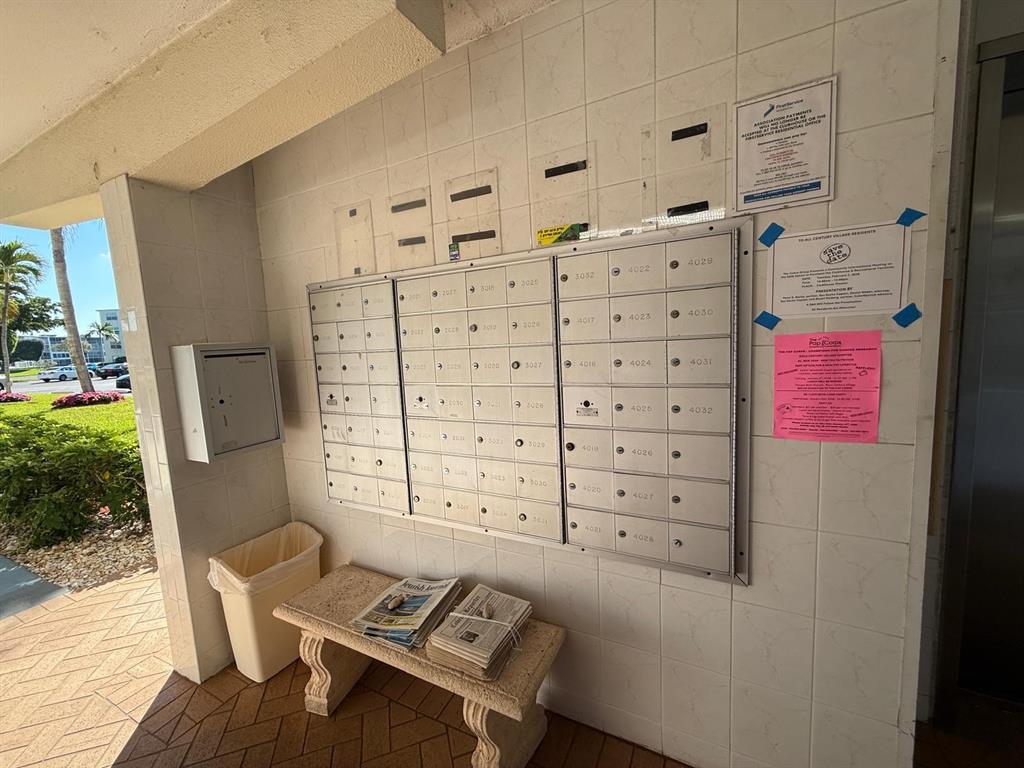 3022 Ainslie Drive, Unit 3022 Boca Raton, FL 33434 - Photo 25 of 29 a view of a bedroom with furniture and a window