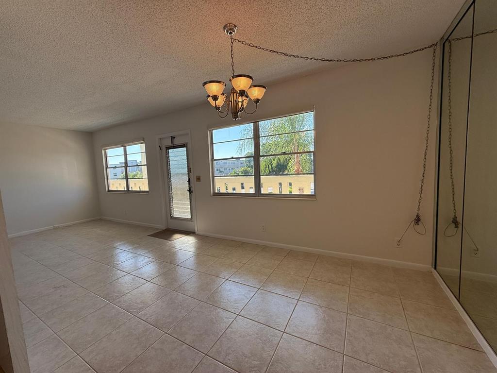 3022 Ainslie Drive, Unit 3022 Boca Raton, FL 33434 - Photo 5 of 29 a view of an empty room with a window