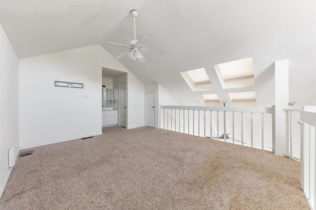 1238 Signal Ridge Place Rockwall, TX 75032 - Photo 22 of 32 a view of an empty room with a window