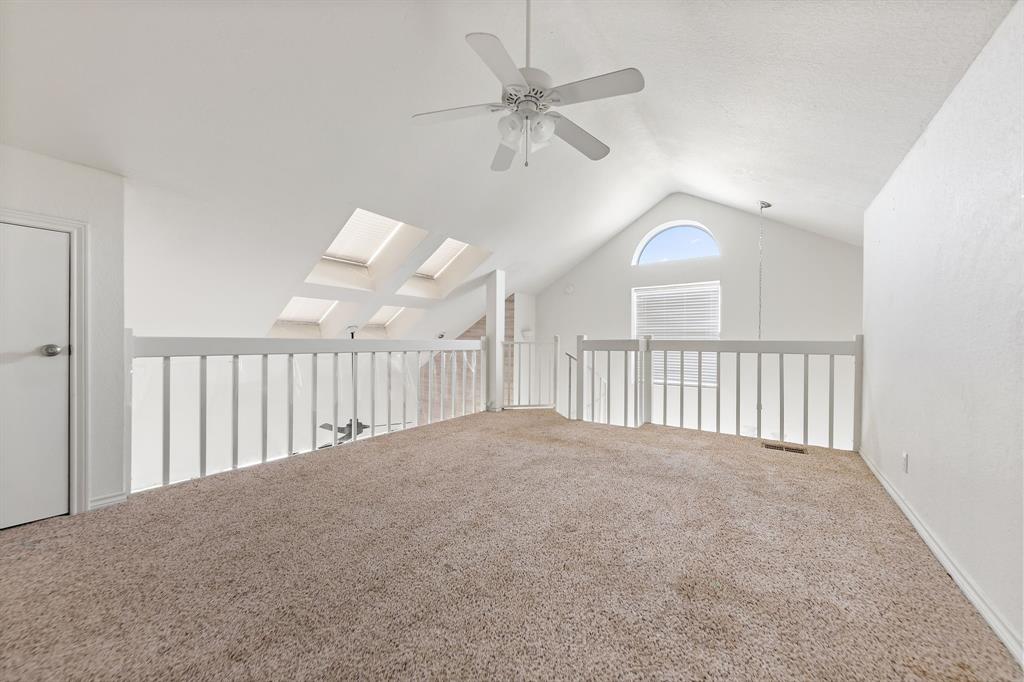 1238 Signal Ridge Place Rockwall, TX 75032 - Photo 23 of 32 a view of an empty room with a window