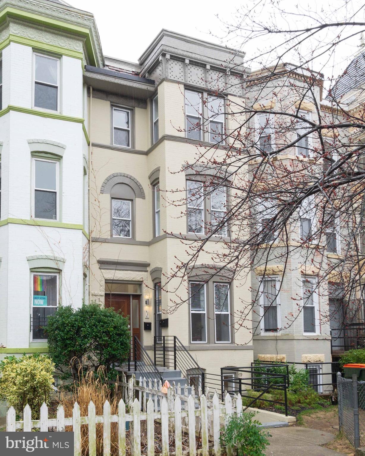 1450 Fairmont Street Northwest, Unit A Washington, DC 20009 - Photo 2 of 26 A boutique building on a tree-lined street