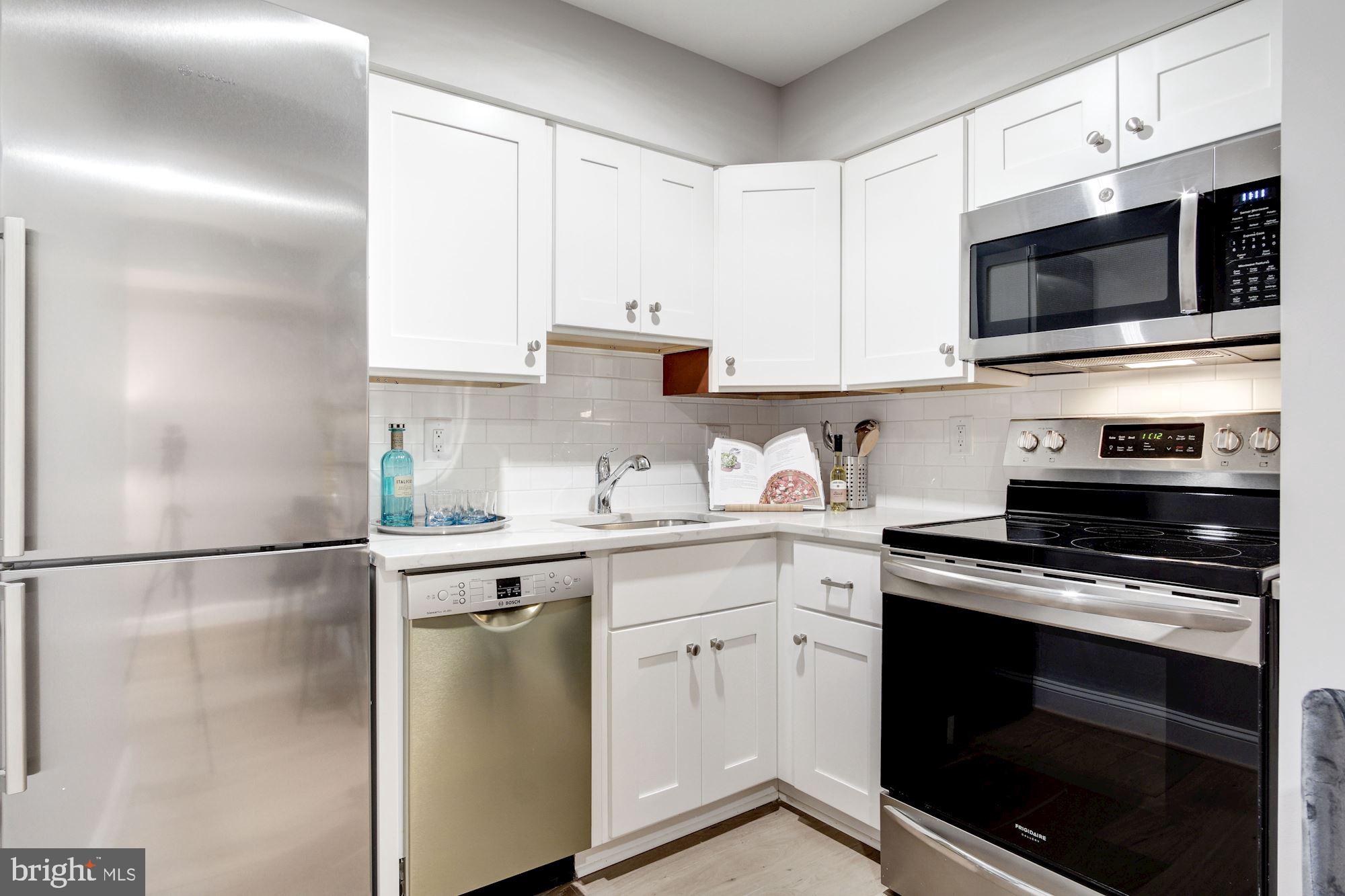1450 Fairmont Street Northwest, Unit A Washington, DC 20009 - Photo 10 of 26 Gourmet kitchen with Bosch appliances