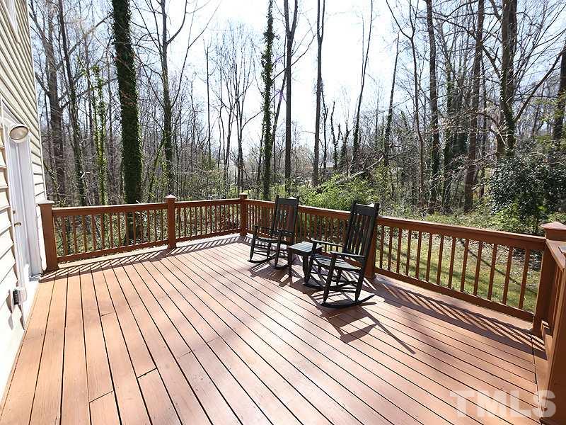 412 Southeast Maynard Road Cary, NC 27511 - Photo 16 of 19 20' x 14' Deck for enjoying the privacy, trees and Spring/Summer/Fall mornings and evenings!