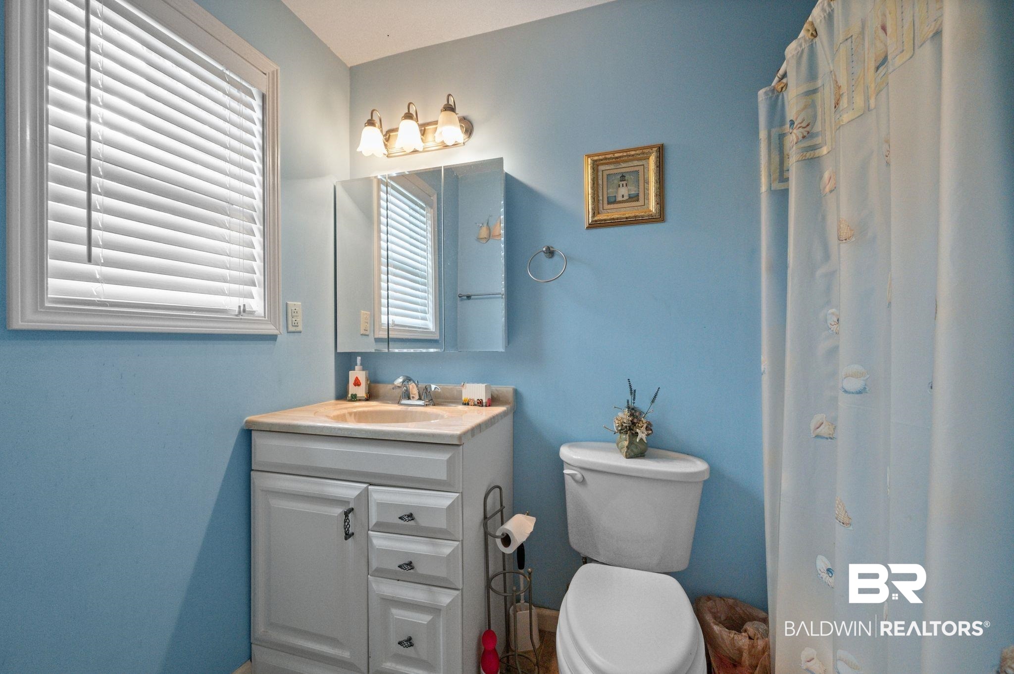 24711 County Road 20, Unit A11 Elberta, AL 36530 - Photo 18 of 35 Bathroom with vanity and curtained shower