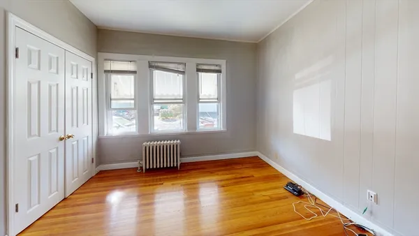 a room with furniture and a window