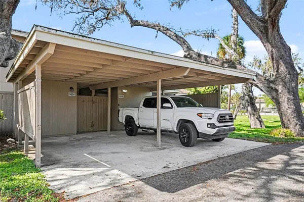 a view of a car in front of a house