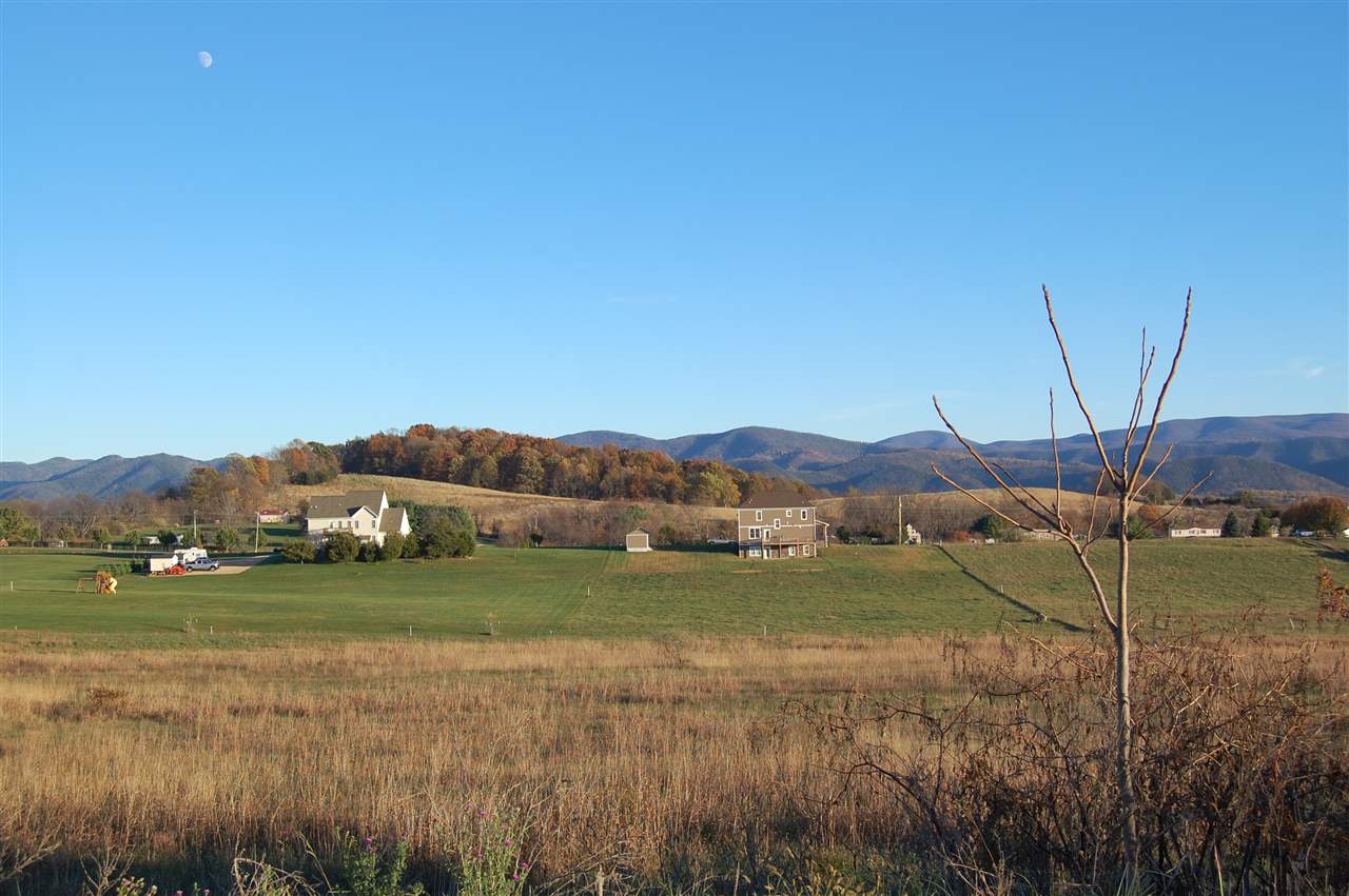 Lot 11 Ridgemore Drive Raphine, VA 24472 - Photo 4 of 6 a view of lake with mountain in the background