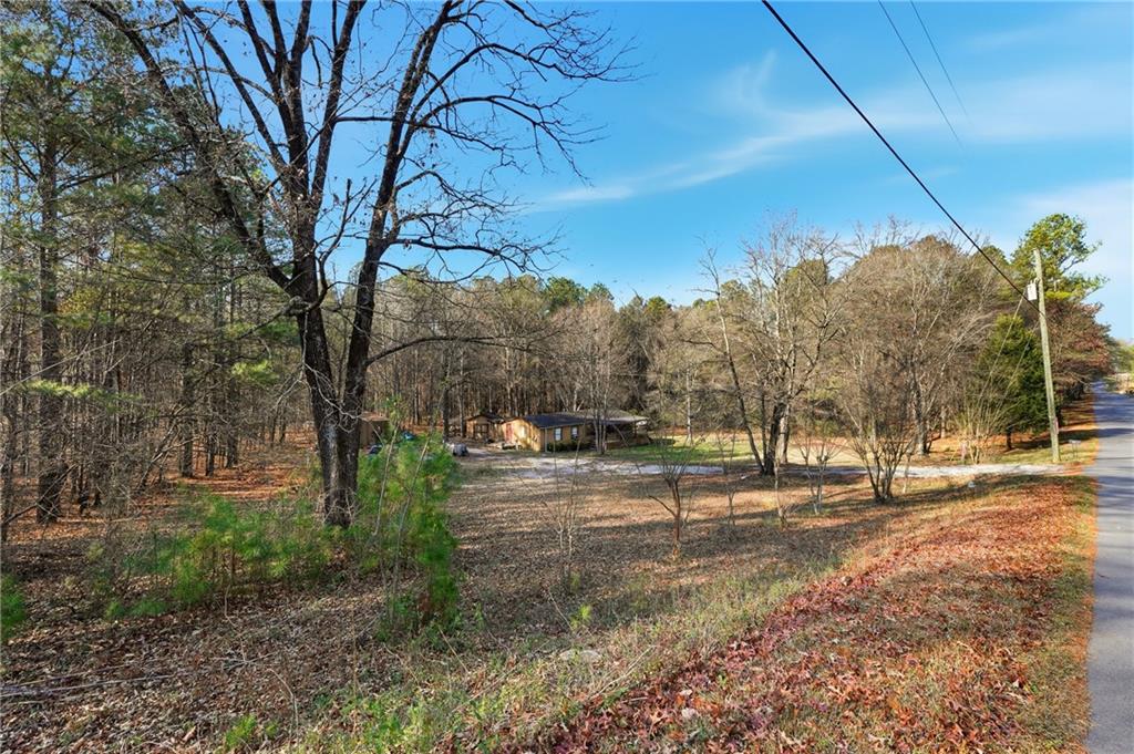 92 Vaughn Spur Northeast Cartersville, GA 30121 - Photo 12 of 50 a view of road with trees