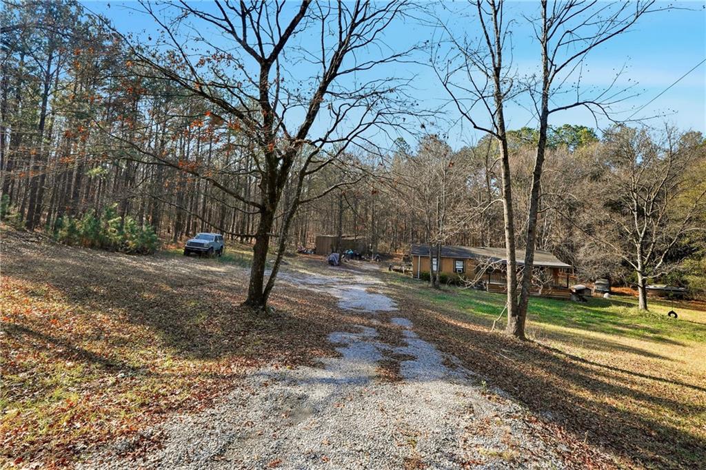 92 Vaughn Spur Northeast Cartersville, GA 30121 - Photo 15 of 50 a view of road with tree