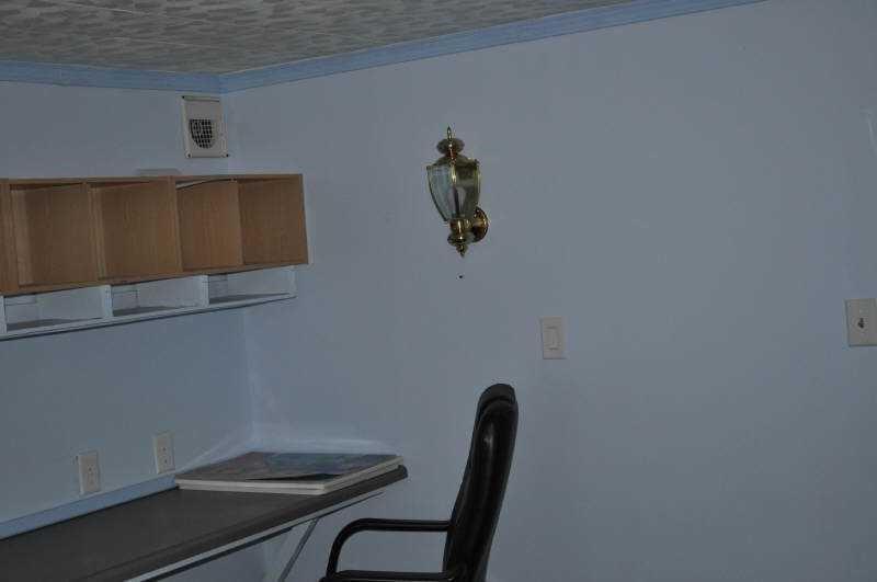 92 Vaughn Spur Northeast Cartersville, GA 30121 - Photo 28 of 50 a view of a chair in the room