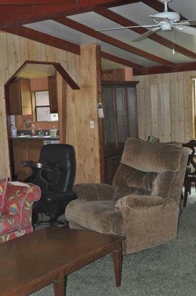 92 Vaughn Spur Northeast Cartersville, GA 30121 - Photo 30 of 50 a living room with furniture and a fireplace