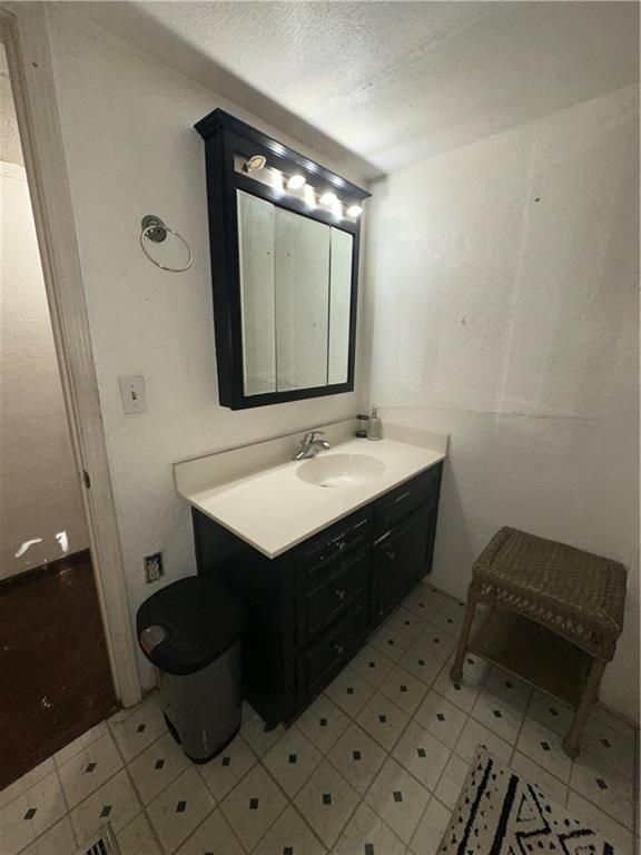 92 Vaughn Spur Northeast Cartersville, GA 30121 - Photo 45 of 50 a bathroom with a sink vanity mirror and toilet