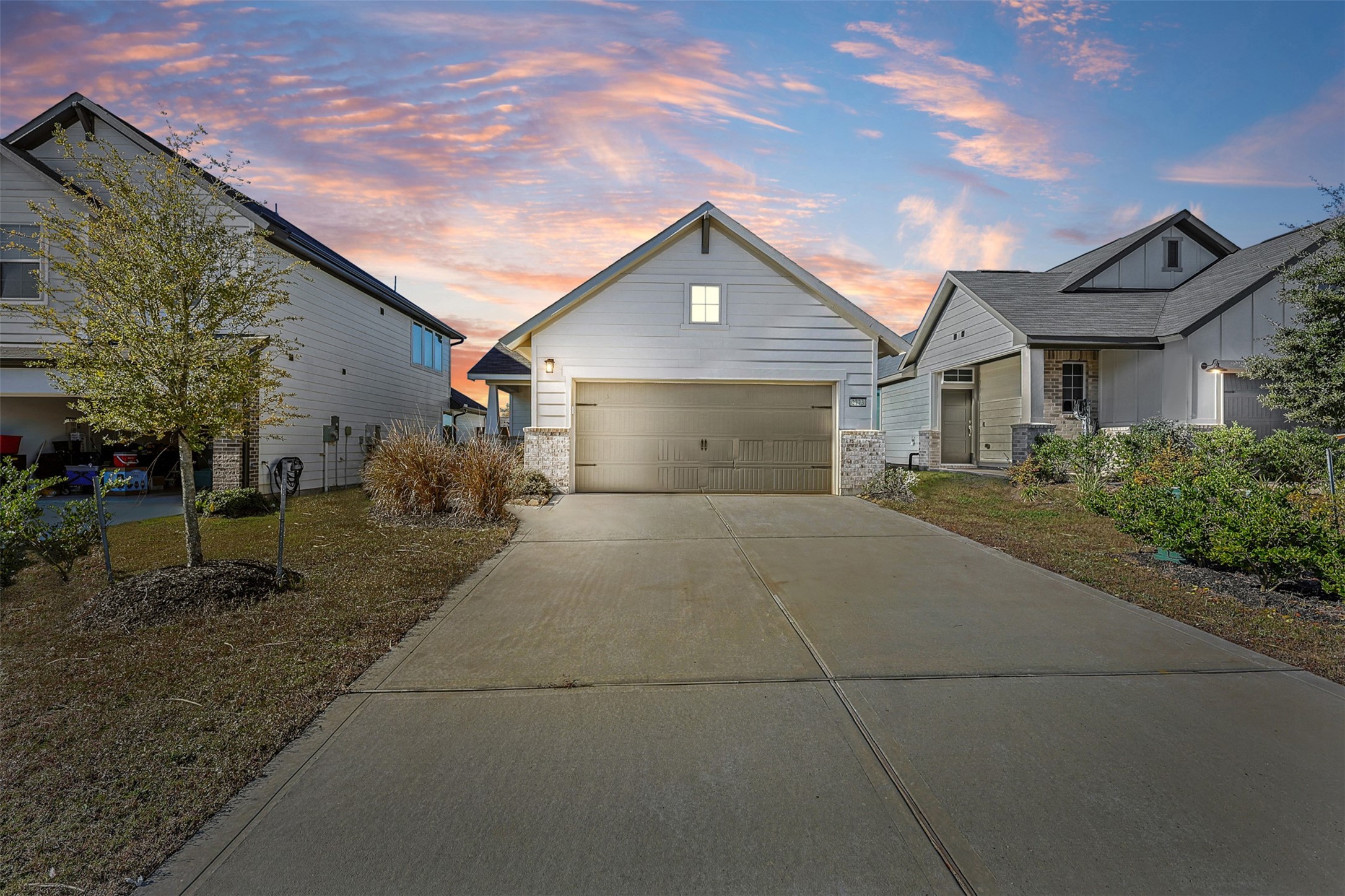 2773 Bluebonnet Ridge Drive Conroe, TX 77304 - Photo 22 of 23 a view of a house with a yard