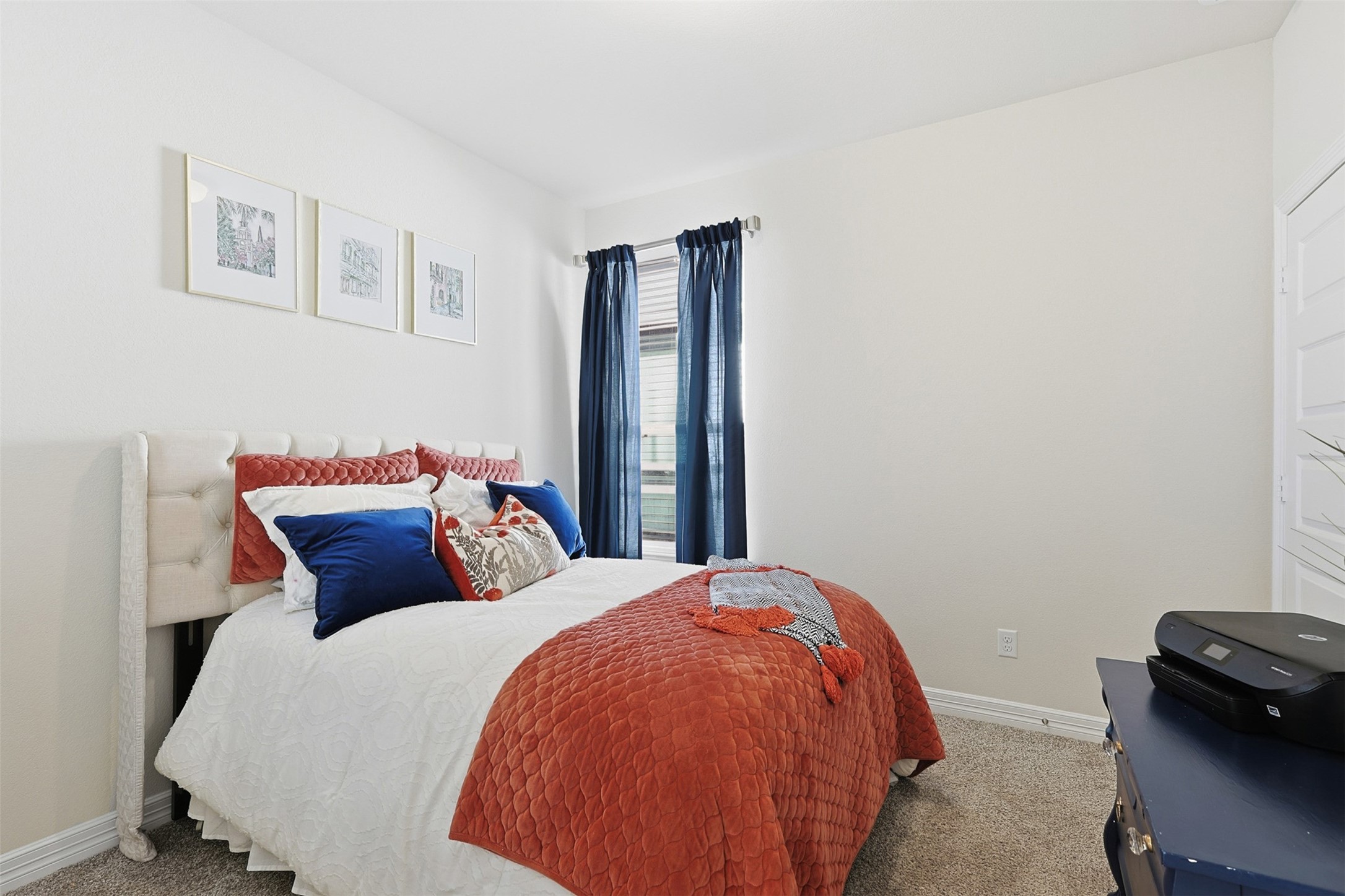 2773 Bluebonnet Ridge Drive Conroe, TX 77304 - Photo 11 of 23 a bed sitting in a bedroom next to a window