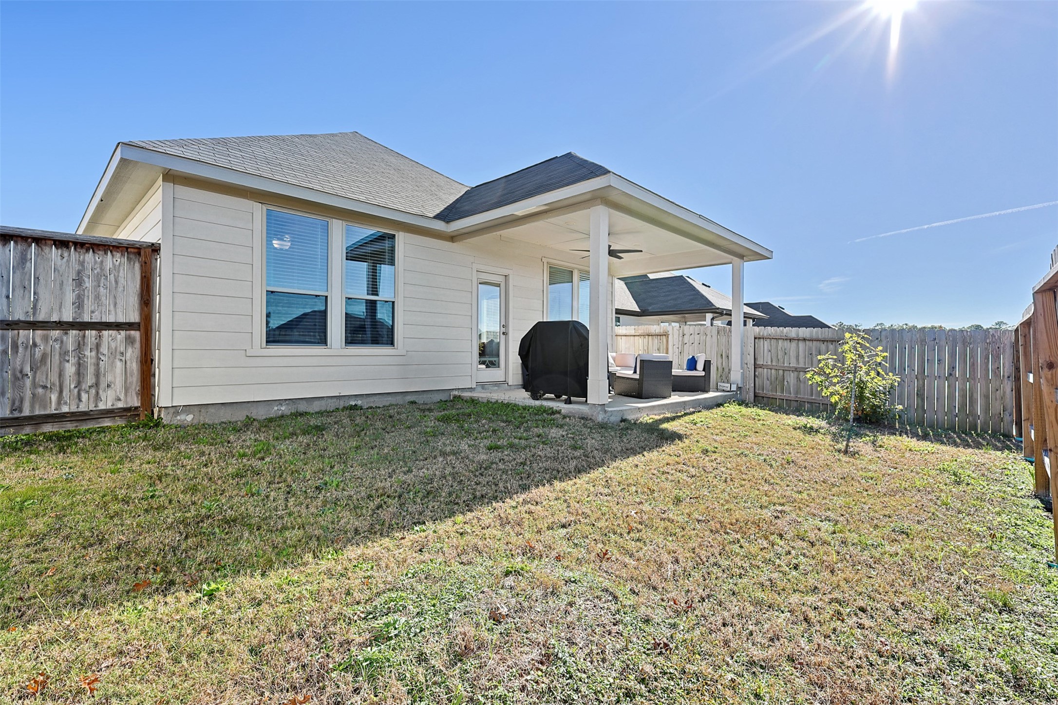 2773 Bluebonnet Ridge Drive Conroe, TX 77304 - Photo 16 of 23 a view of a house with a yard