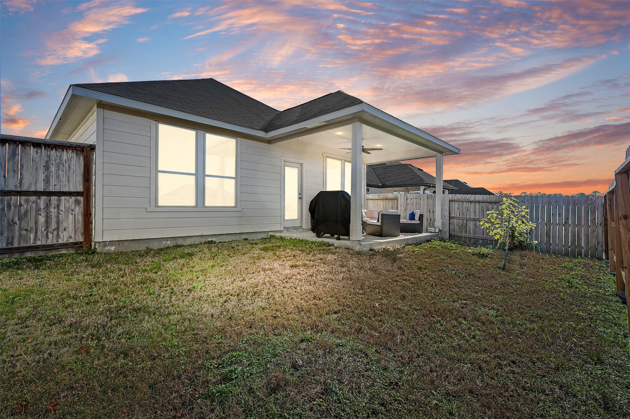 2773 Bluebonnet Ridge Drive Conroe, TX 77304 - Photo 17 of 23 a view of a house with backyard and garden