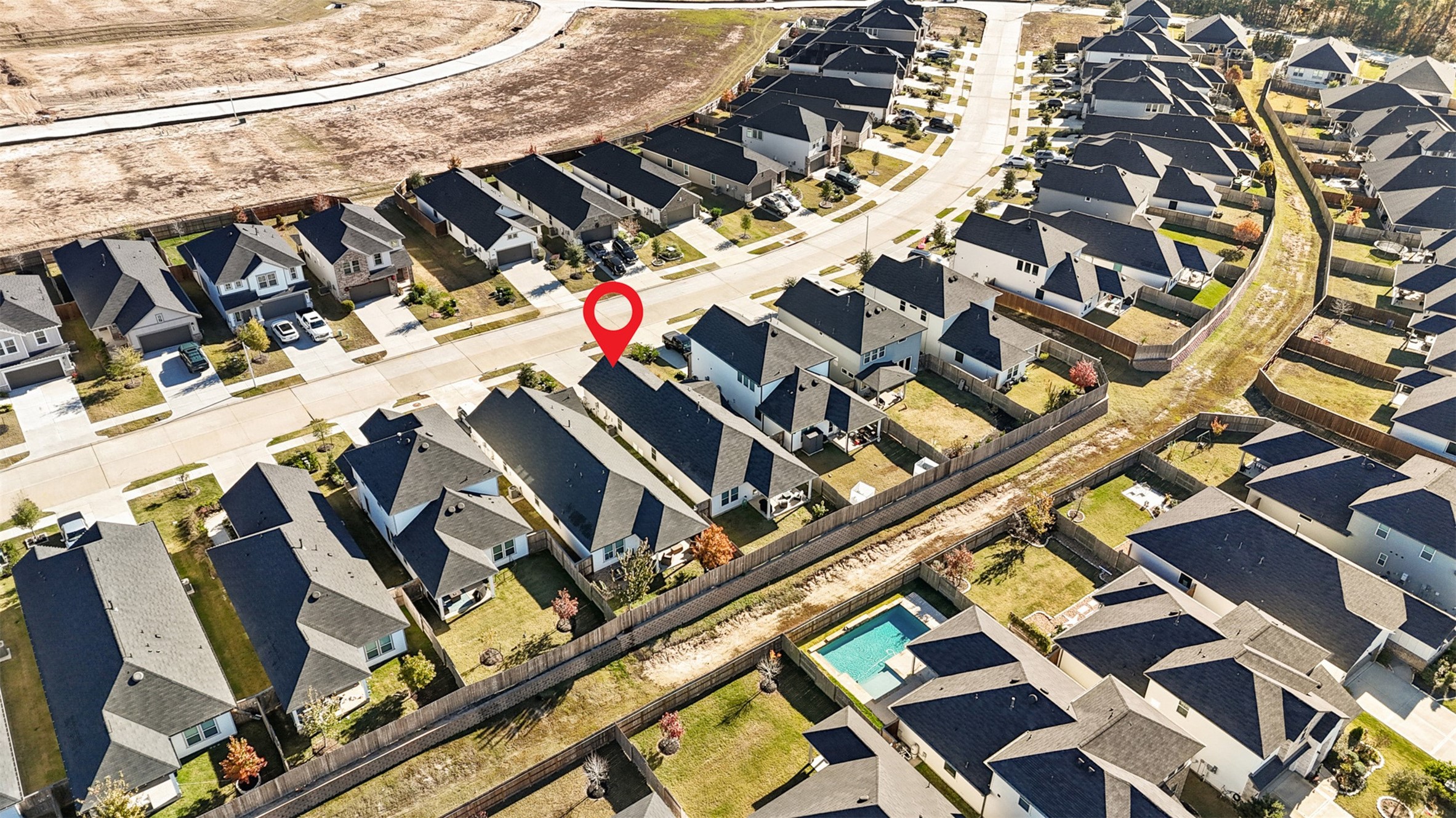 2773 Bluebonnet Ridge Drive Conroe, TX 77304 - Photo 19 of 23 walk in front of a building