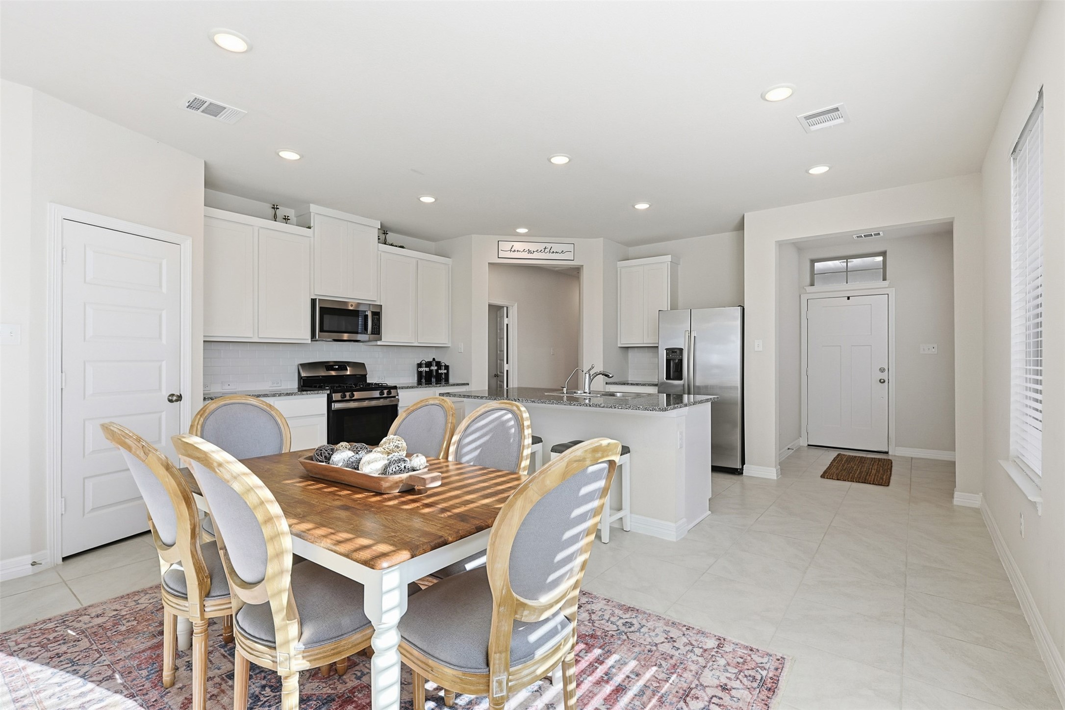 2773 Bluebonnet Ridge Drive Conroe, TX 77304 - Photo 23 of 23 a view of a dining room with furniture