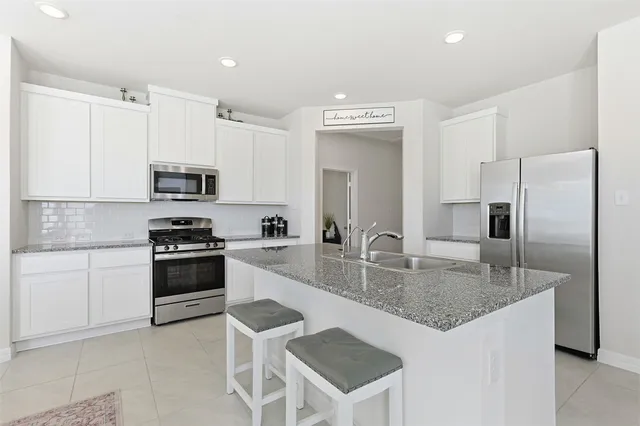 a view of a pathway with house on both side