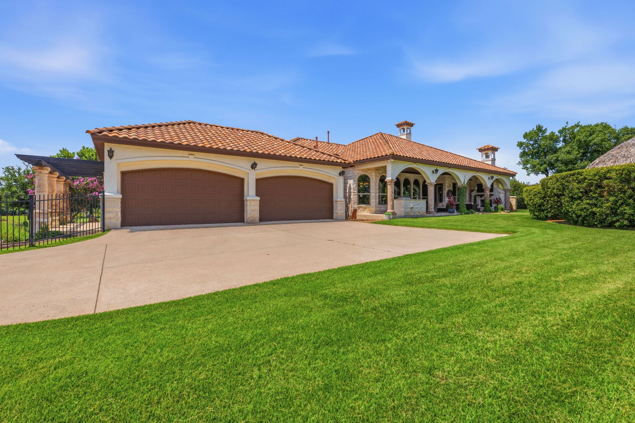 816 Brave Face Street Leander, TX 78641 - Photo 31 of 40 A spacious driveway leads to this charming home with an attached garage and expansive, well-maintained lawn.