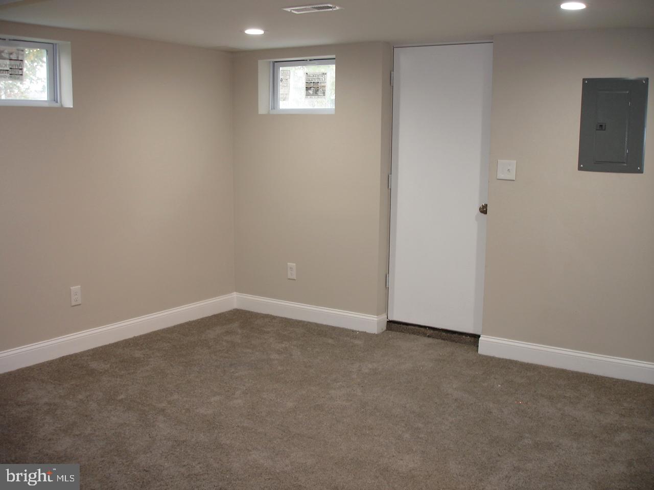 5404 Leith Road Baltimore, MD 21239 - Photo 16 of 35 Lower Level Family Room with walk out