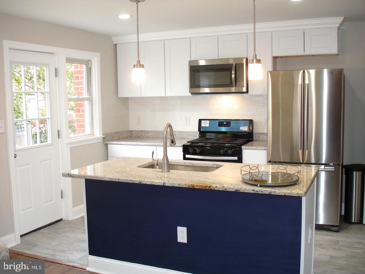 5404 Leith Road Baltimore, MD 21239 - Photo 8 of 35 Granite Counter Tops / stainless steel appliances