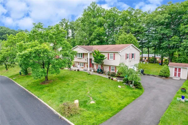 a aerial view of a house with garden