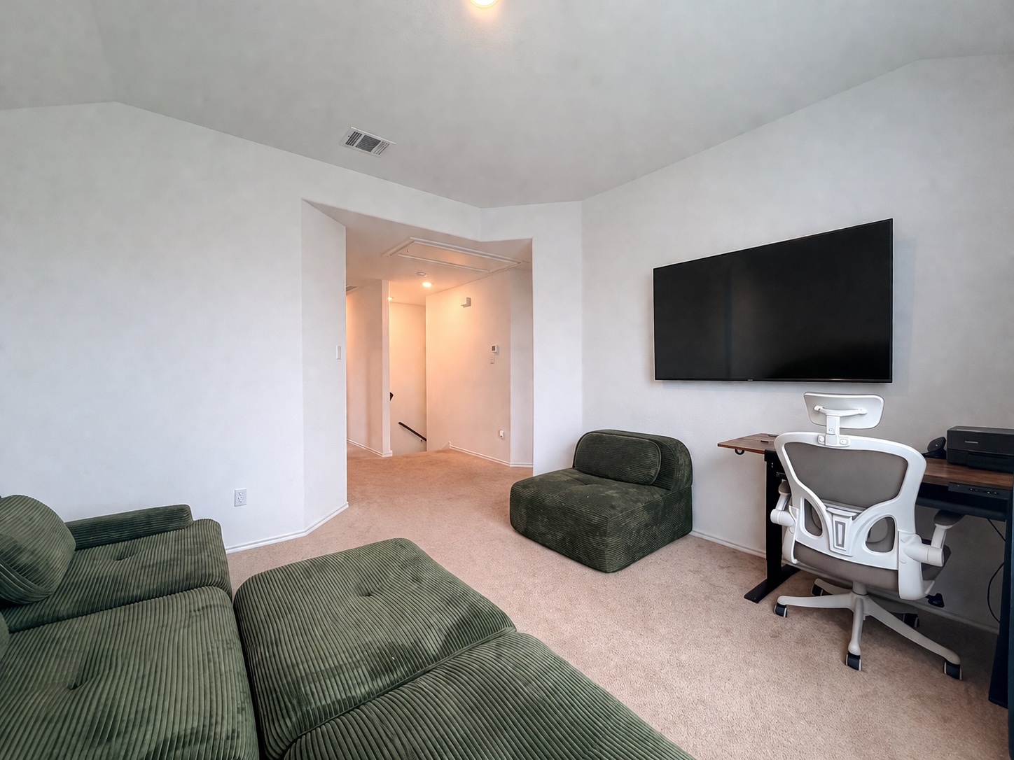 400 Canley Loop Hutto, TX 78634 - Photo 12 of 20 a livingroom with workspace and a couch