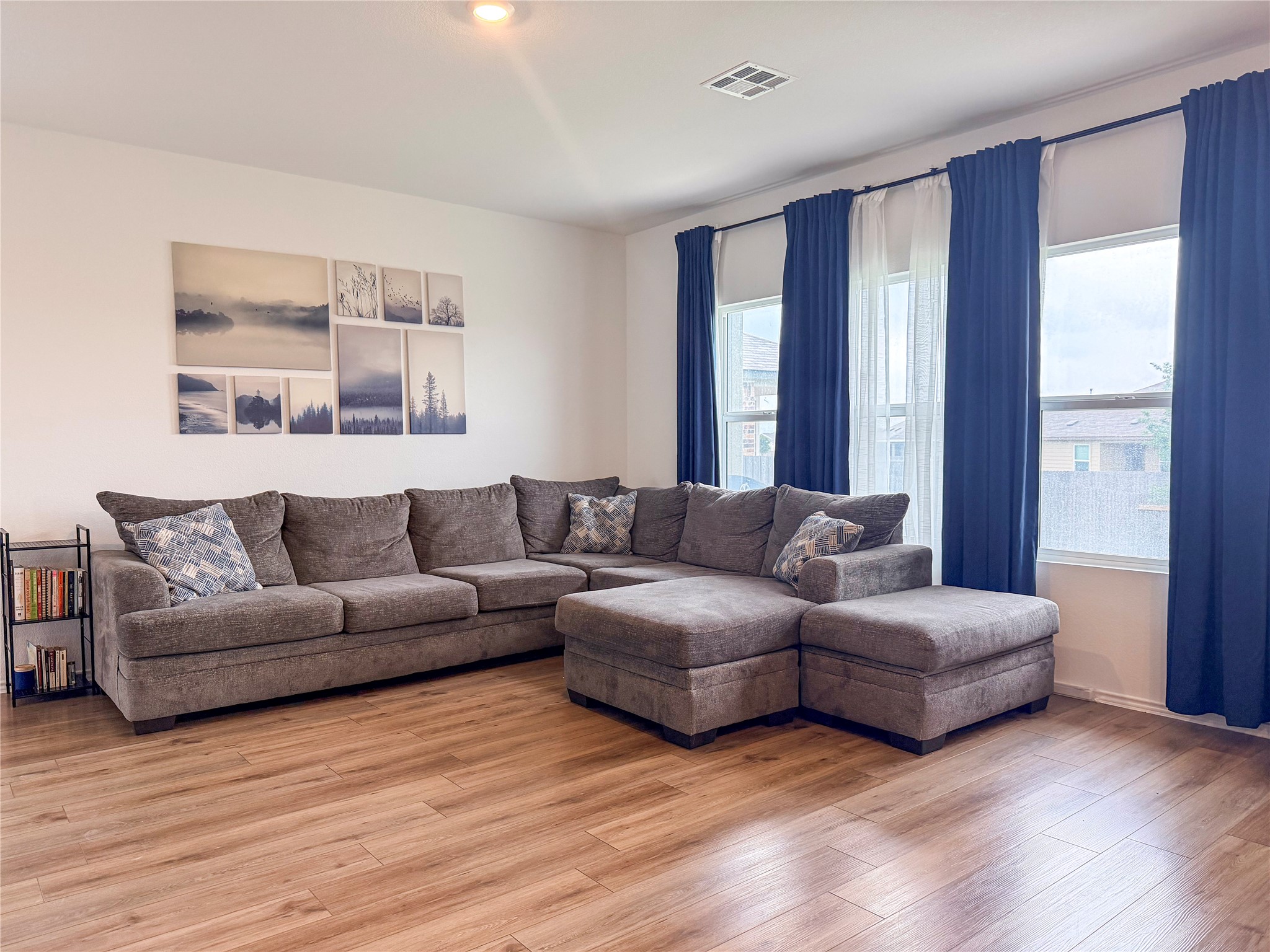 400 Canley Loop Hutto, TX 78634 - Photo 5 of 20 a living room with couches and a large window
