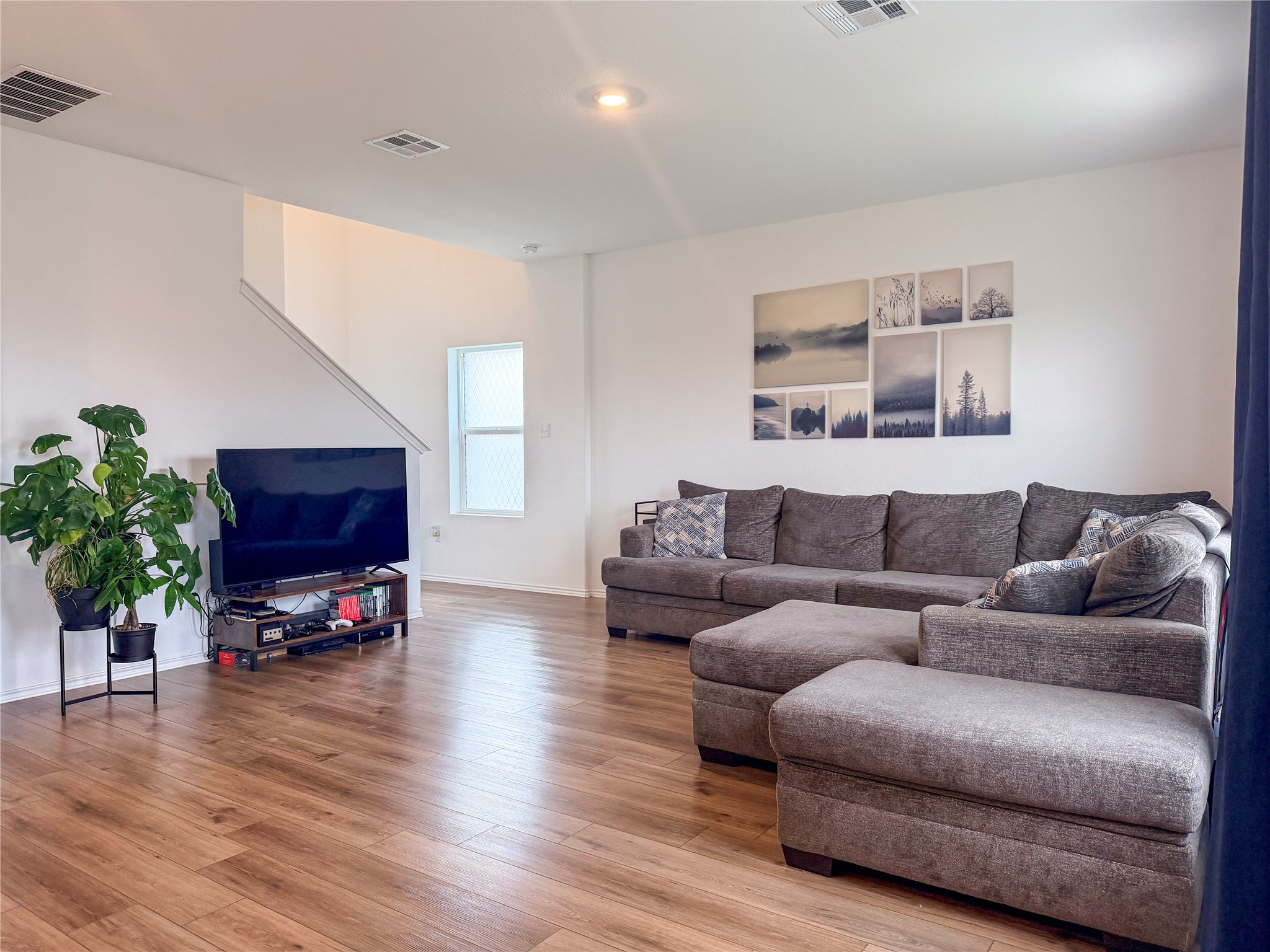 400 Canley Loop Hutto, TX 78634 - Photo 6 of 20 a living room with furniture and a flat screen tv